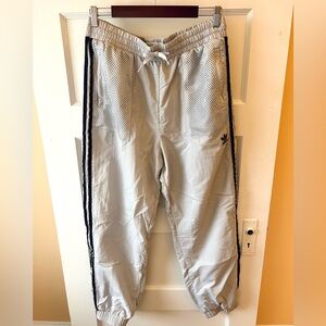Adidas joggers with navy stripes